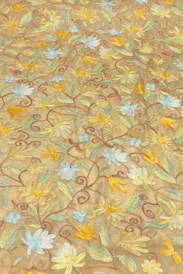 Floral pattern with flowers and leaves on a beige background