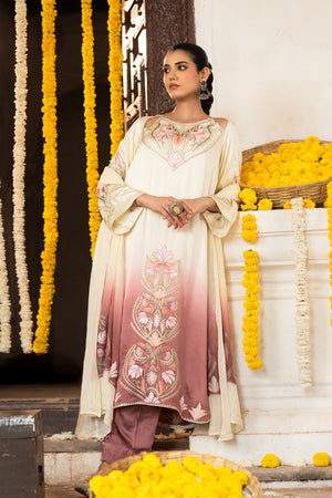 #OmbreCream&Mauve Woman in a traditional outfit with floral decorations in a festive setting