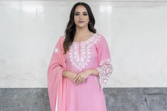 Girl wearing pink salwar suit