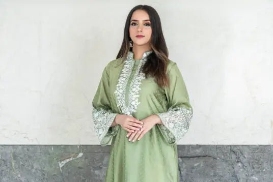 women wearing light green stylish long kurti