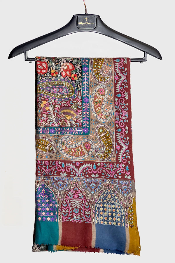 Detail of sozni needlework and kalamkari motifs on pure pashmina, showing thread definition on tight weave