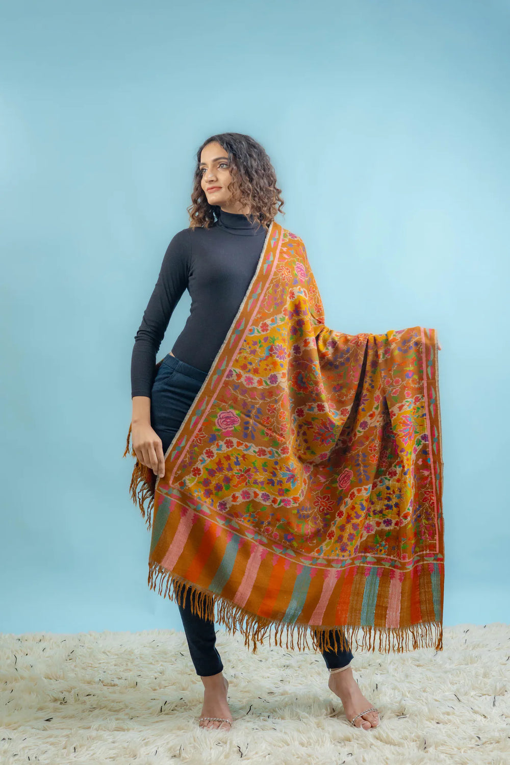 Mustard Kani Pashmina shawl draped over shoulders, showing full width and length