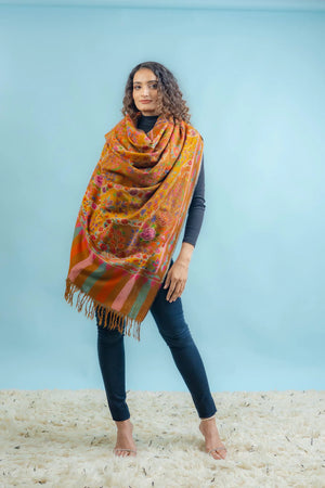 Detail of tight Kani weave on mustard Pashmina showing colour transitions in the floral pattern