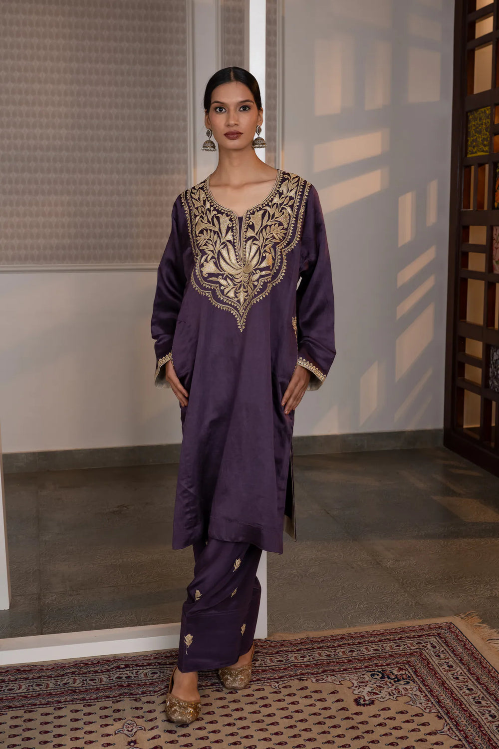 #Mauve - Full-length front view of purple linen satin kurta and salwar set with gold embroidered yoke and slim cuff border.