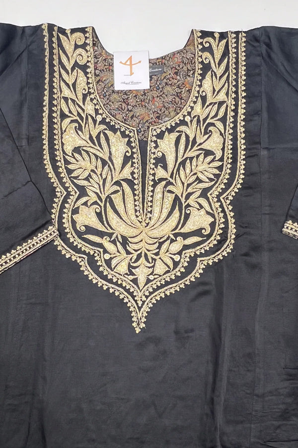 #Black - Flat-lay of black colourway kurta showing full puff tilla gold embroidered yoke with lotus, floral vine and leaf motifs; Angad Creations label visible.