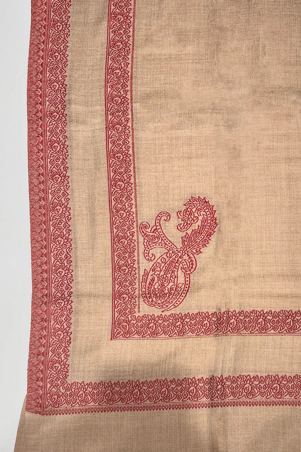 # Natural - Natural wool shawl corner detail showing red machine woven double border with paisley boteh and floral band