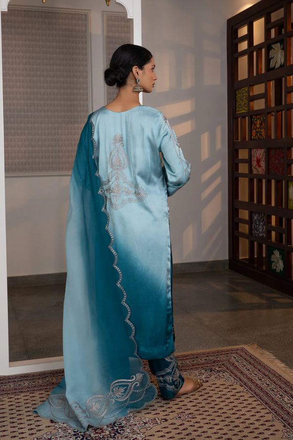 #OmbreSky&PeacockBlue - Back view of ombre sky-to-peacock-blue cotton satin kurta with silver zari back medallion and embroidered dupatta border visible