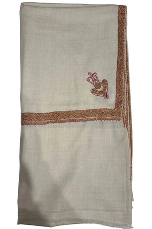 White shawl with brown embroidery on a white background