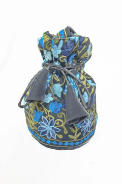 Decorative drawstring bag with floral pattern on a white background