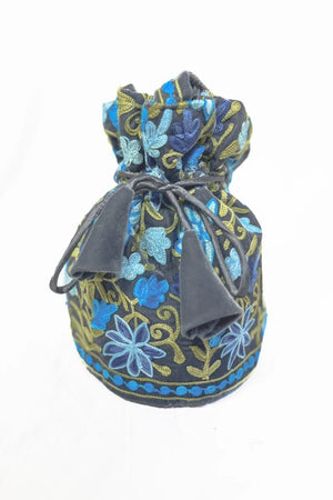 Decorative drawstring bag with floral pattern on a white background