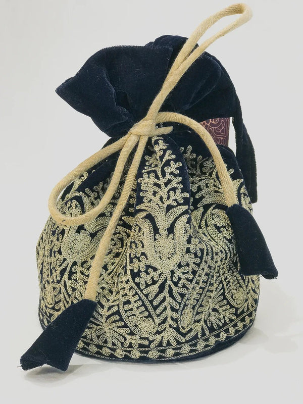 Decorative drawstring bag with black and gold pattern on a white background
