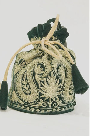 #BottleGreen Decorative drawstring bag with intricate patterns on a white background