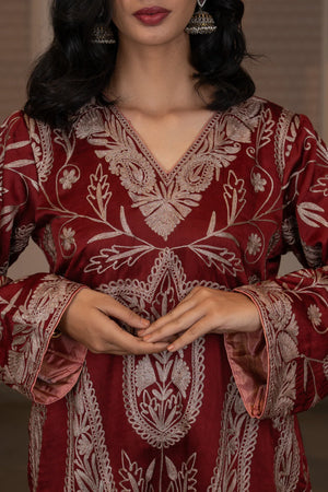 #CrimsonMaroon - Front torso close-up showing all-over dull-gold floral and paisley embroidery with medallion motif on wine linen satin kurta