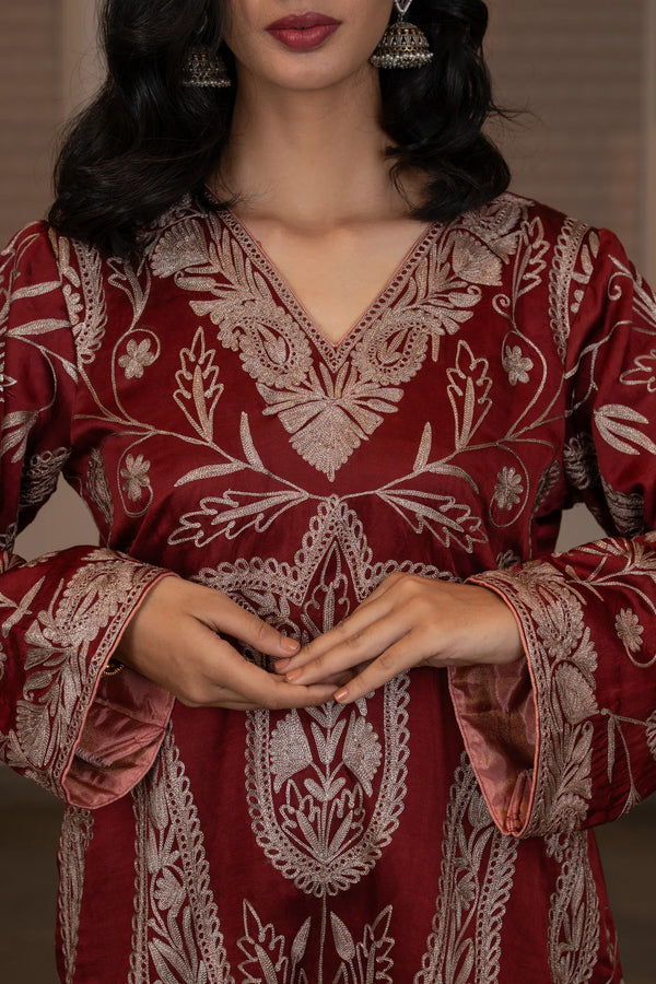 #CrimsonMaroon - Front torso close-up showing all-over dull-gold floral and paisley embroidery with medallion motif on wine linen satin kurta