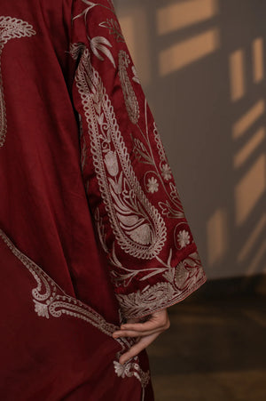 #CrimsonMaroon - Sleeve back detail showing dense dull-gold paisley and floral vine embroidery running full length of sleeve on wine linen satin