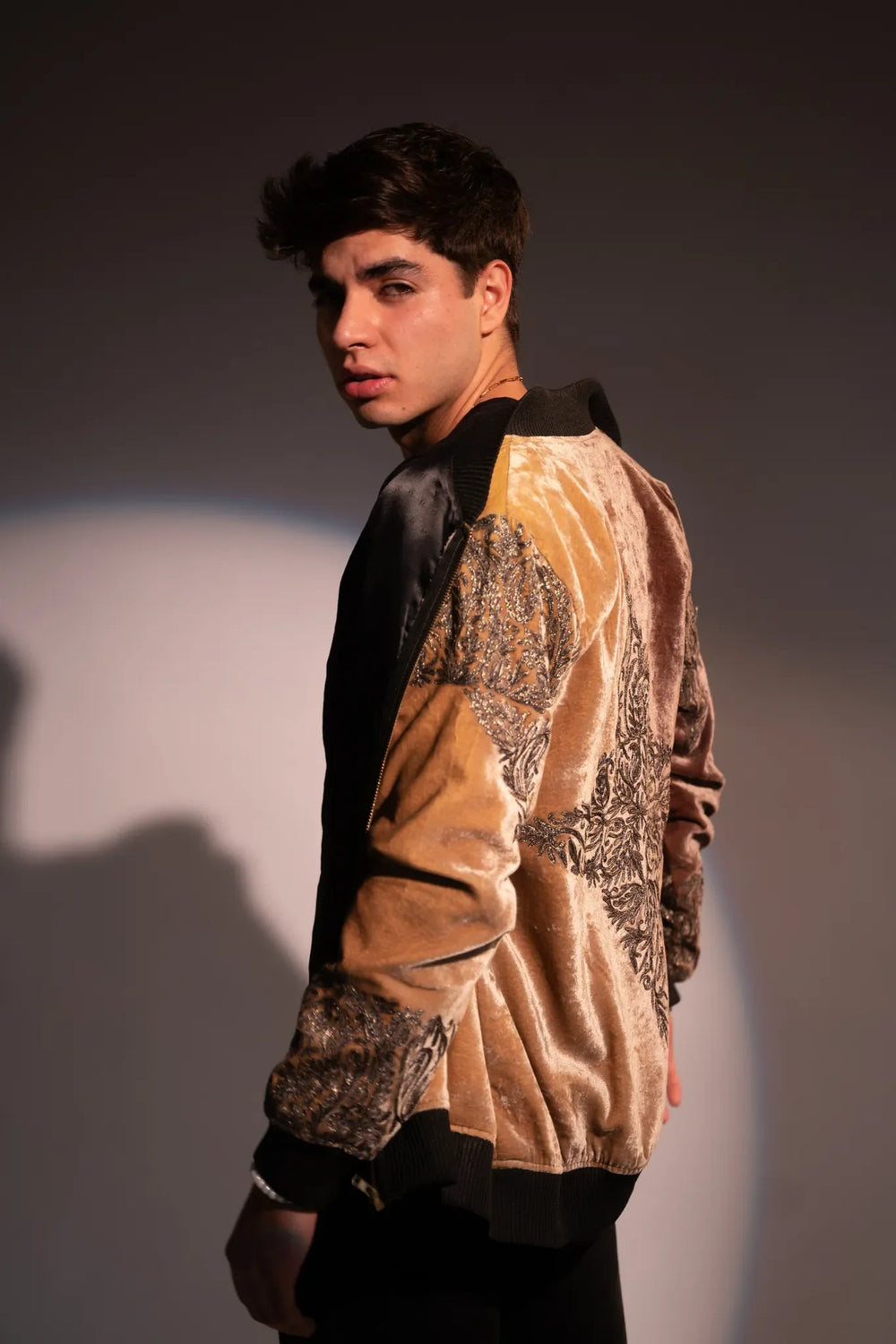man wearing a bomber jacket