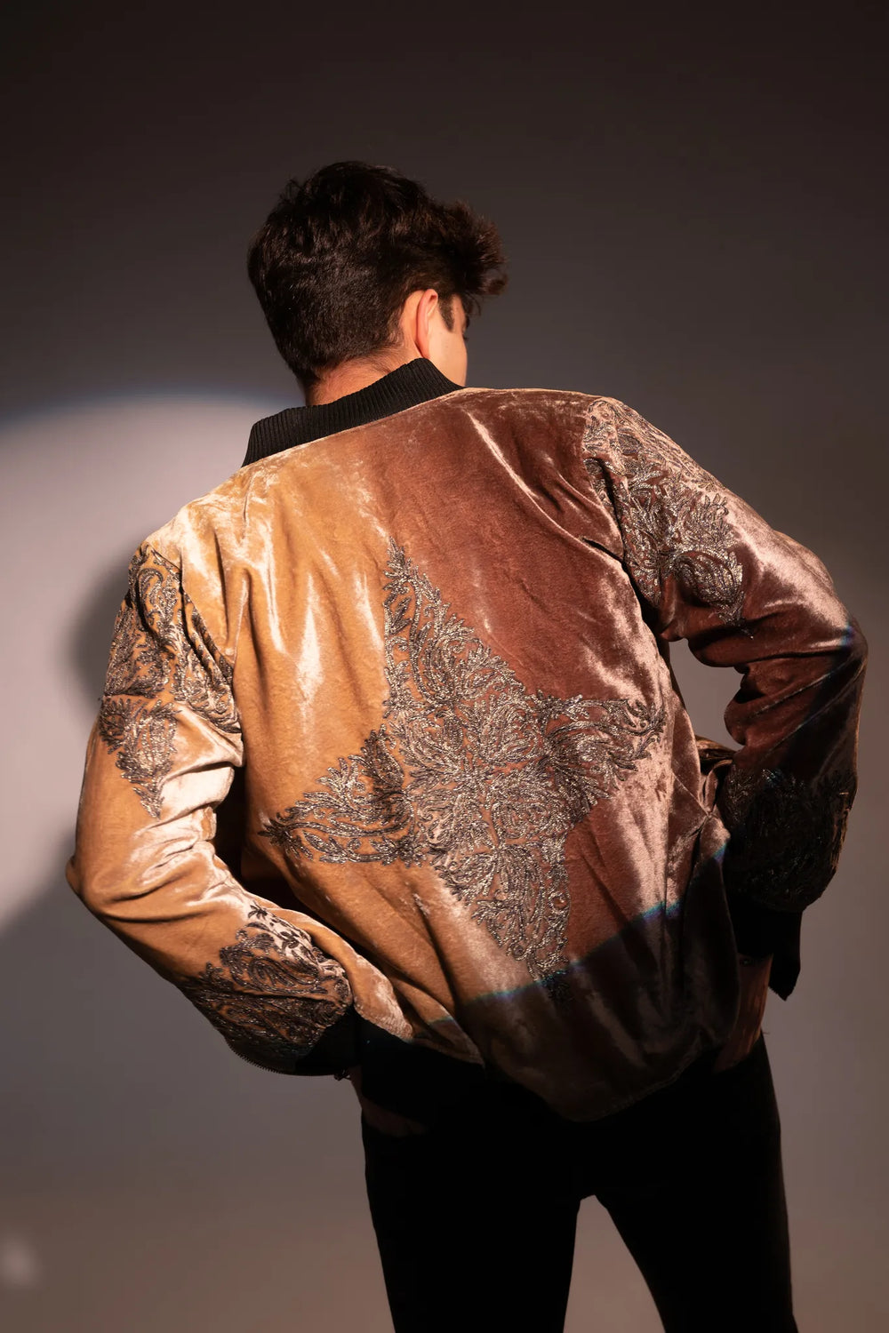man wearing a bomber jacket
