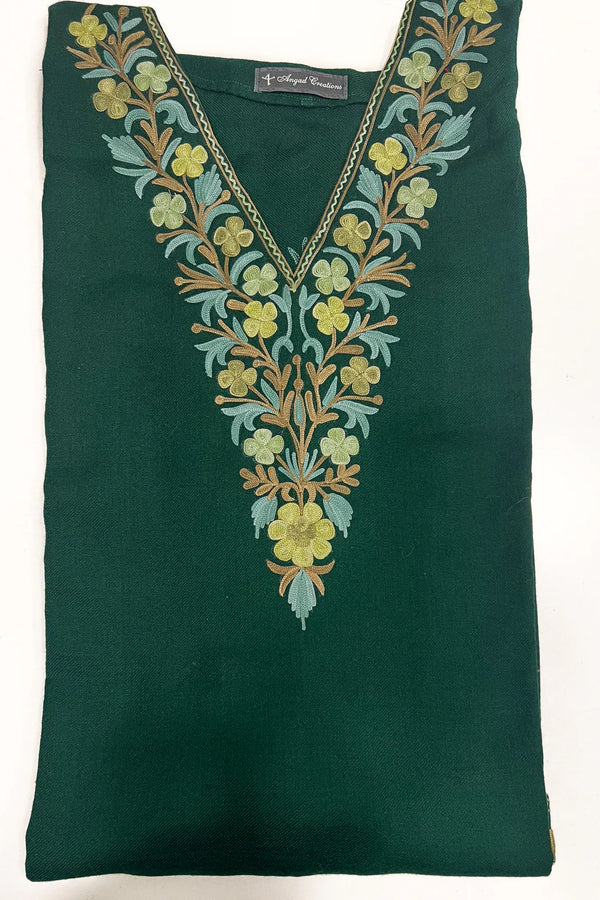 #BottleGreen dress with floral embroidery on a white background