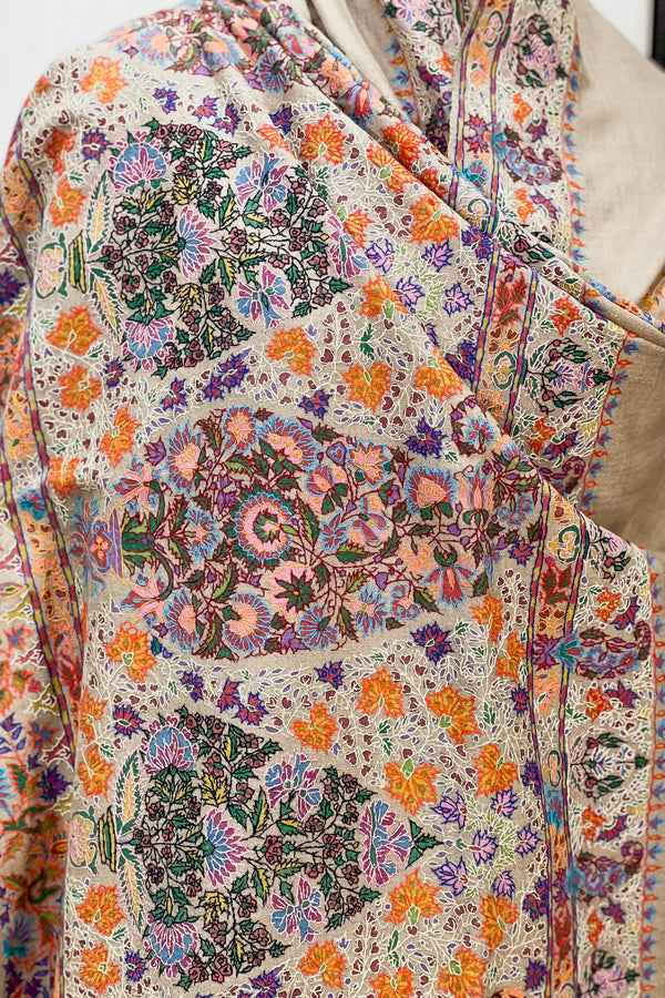 Shawl draped to show full width and depth of the kalamkari painted field on natural beige Pashmina