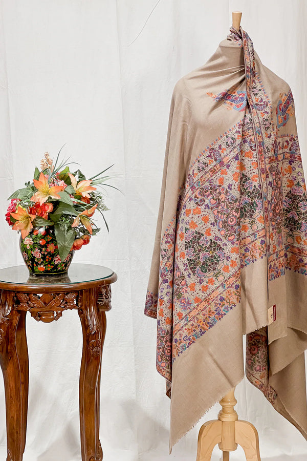 Close view of kalamkari painted motifs with thread outlining on natural beige Pashmina
