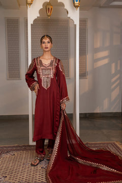 #Maroon - Full front view of maroon suit set with embroidered dupatta trailing on floor, arch backdrop, lanterns visible
