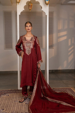 #Maroon - Full front view of maroon suit set with embroidered dupatta trailing on floor, arch backdrop, lanterns visible