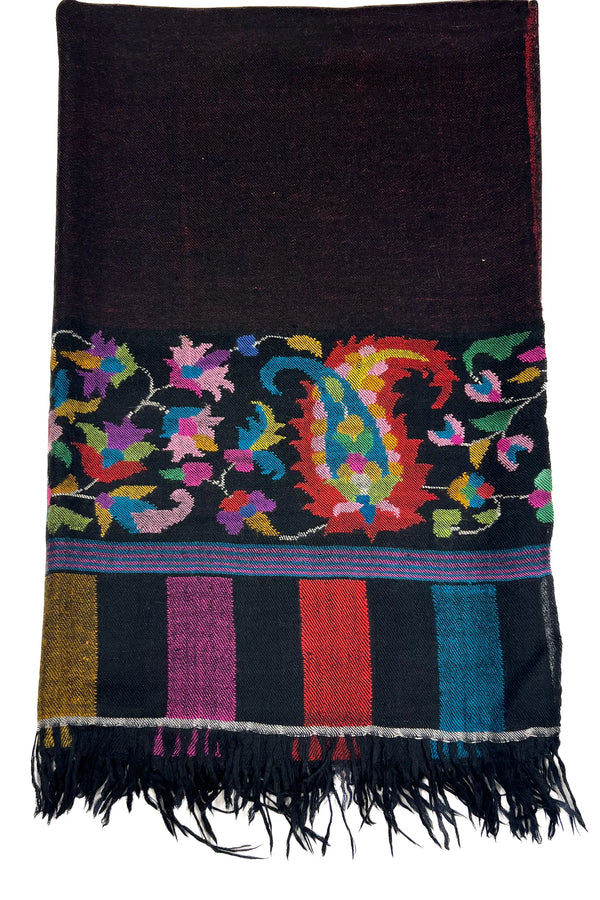 Black scarf with colorful paisley patterns and fringes on a white background