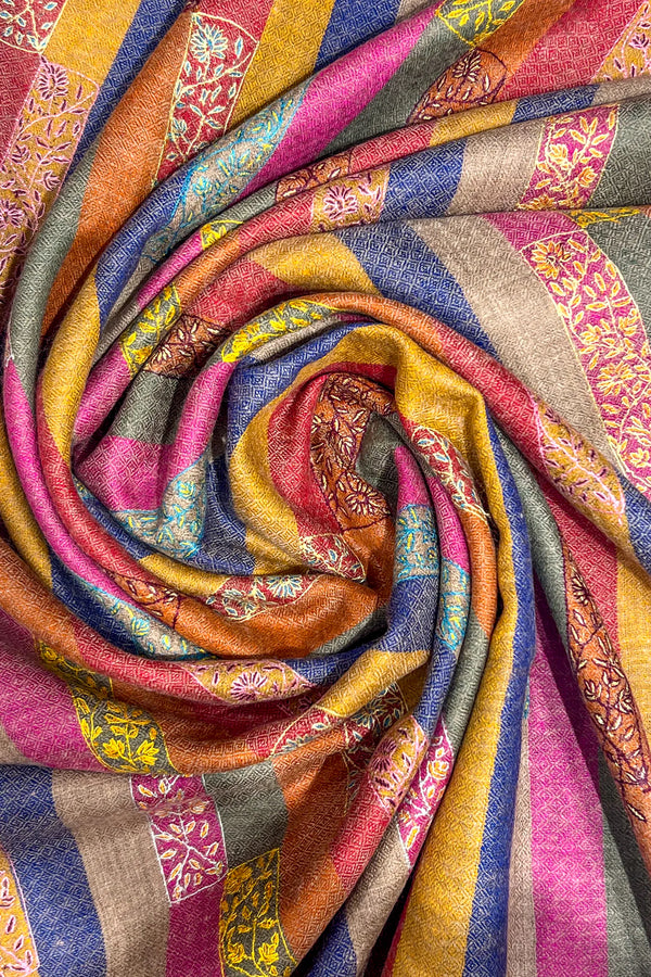 Colorful fabric with patterns rolled up