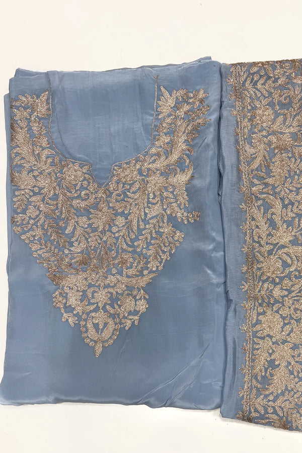 #PowderBlue - Unstitched powder blue Indian crepe kurta fabric with copper-gold zari V-neck panel; dupatta fabric with wide embroidered border alongside.
