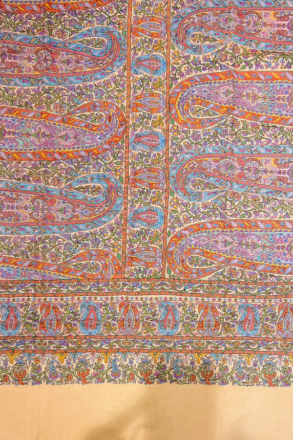 Close detail of multi-colour kalamkari painting and thread outline work on pure pashmina