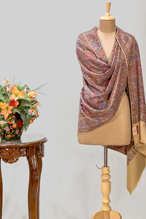 Draped beige pashmina shawl showing the full spread of hand-painted kalamkari design