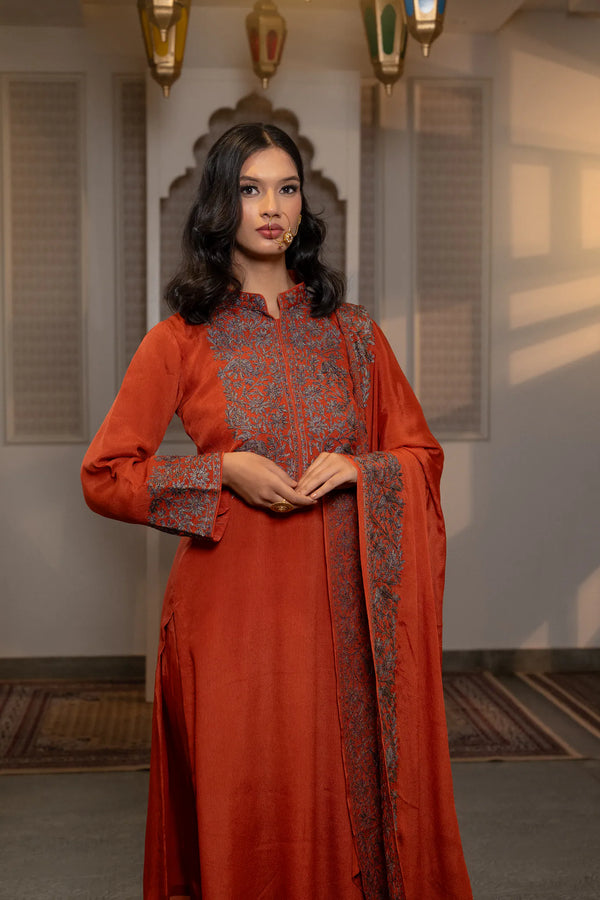 #Rust - Full-length front view of rust embroidered Chinon suit set with dupatta draped; mandarin collar and side-slit hemline visible