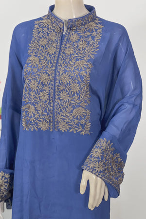 #Blue - Close-up of periwinkle blue Chinon kurta chest and cuffs; gold floral vine embroidery on yoke and cuff band