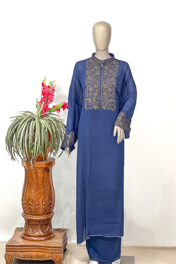 #Blue - Repeated front close-up of periwinkle blue Chinon kurta; mandarin collar with zip; full yoke covered in gold floral embroidery