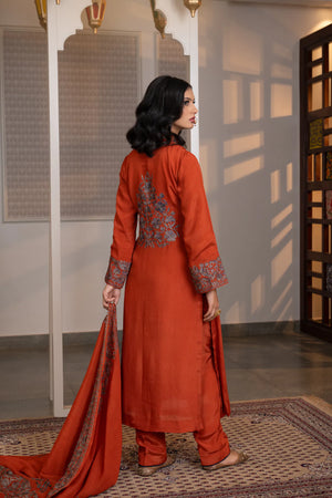 #Rust - Chinon suit set with dull gold and navy Kashmiri floral embroidery on yoke, cuffs, and dupatta border — back view