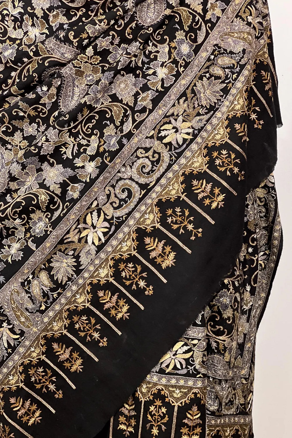 Shawl draped to show the full jaal coverage and tight weave structure of the black pashmina