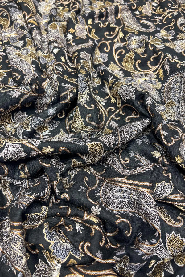 Reverse side or folded view of black pashmina shawl showing tight weave and embroidery depth