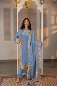 Sky blue tissue kurta suit set with gold and silver zari Kashmiri embroidery, organza dupatta, straight pants, front view.