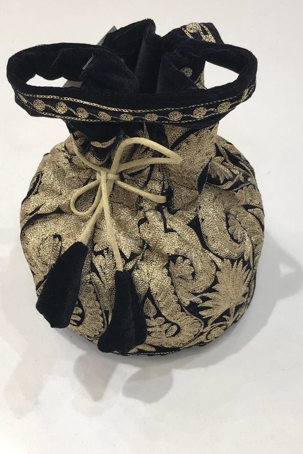 #black Decorative drawstring bag with black and gold pattern on a white background