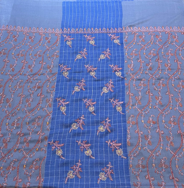 Reverse side or draped corner detail of the sozni hand-embroidered pure pashmina shawl in dual blue