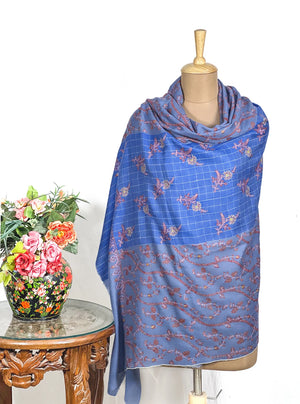 Dual blue pashmina shawl folded to show the tight weave and embroidered jaal surface