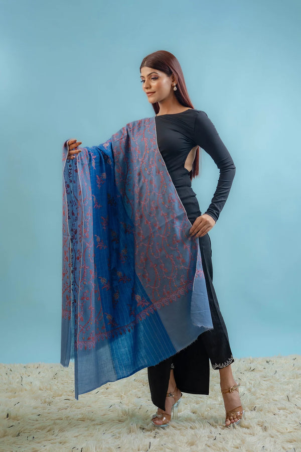 Detail of sozni embroidery at the border of the dual blue pashmina shawl