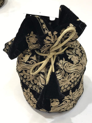 #black Black and gold patterned drawstring bag on a white background